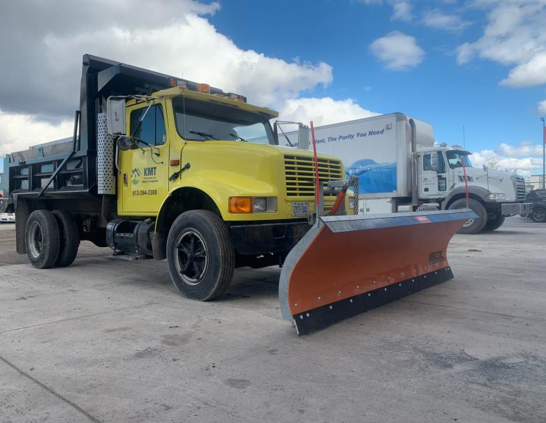 10' plow on truck curb side view